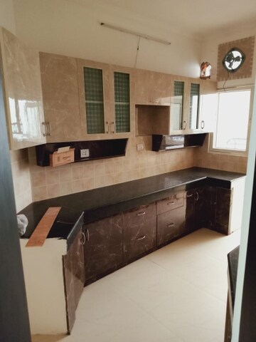 Kitchen in 2.5 BHK Apartment at Ramprastha Awho, Sector 95 – for Sale