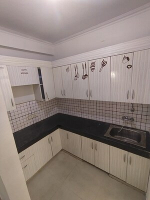 Kitchen in 2 BHK Apartment at Hawelia Valencia Homes, Sector 1 Greater Noida – for Rent