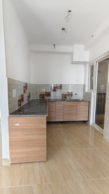 Kitchen in 2 BHK Apartment at Gaur Yamuna City 16th Park View, Gaur Yamuna City – for Sale