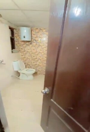 Bathroom in 3 BHK Apartment at Raj Nagar Extension – for Rent