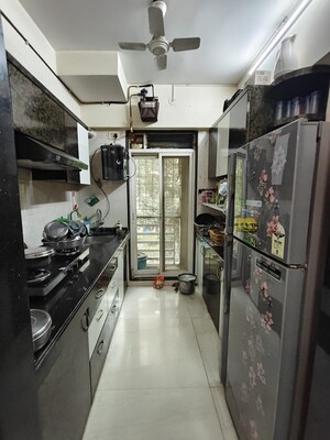 Kitchen in 2 BHK Apartment at RDC Pinewood, Thane West – for Sale