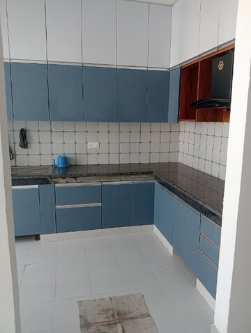 Kitchen in 2 BHK Apartment at Urban Axis Urban Woods, Sushant Golf City – for Rent