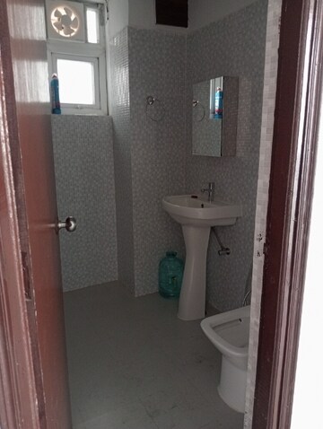 Bathroom in 2 BHK Apartment at Urban Axis Urban Woods, Sushant Golf City – for Rent
