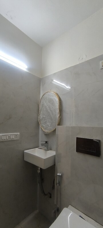 Bathroom in 1 BHK Builder Floor at Ansal Royale Casa, Sector 55 – for Rent