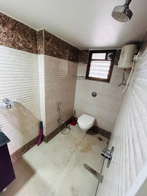 Bathroom in 2 BHK Apartment at Kings Anand Sham, Bhandup East – for Rent