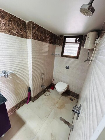 Bathroom in 2 BHK Apartment at Kings Anand Sham, Bhandup East – for Rent