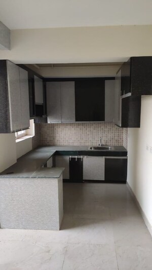 Kitchen in 2 BHK Apartment at Jaypee Greens Aman, Sector 151 – for Sale