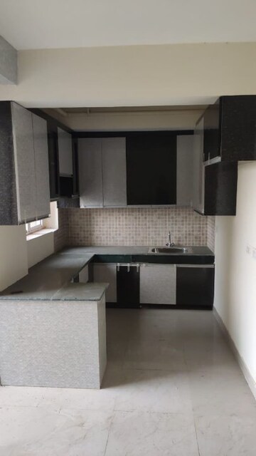 Kitchen in 2 BHK Apartment at Jaypee Greens Aman, Sector 151 – for Sale