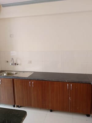 Kitchen in 4 BHK Apartment at Cosmos Express 99, Sector 99 – for Sale