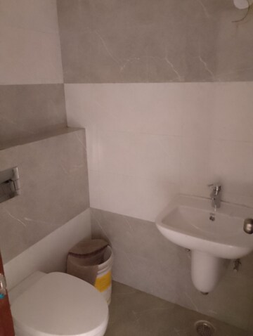 Bathroom in 4 BHK Apartment at Cosmos Express 99, Sector 99 – for Sale