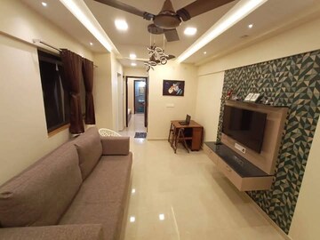 Living Room in 1 BHK Apartment at Lodha Palava Eviva K To T Urbano A C F and I To T, Dombivli East – for Sale