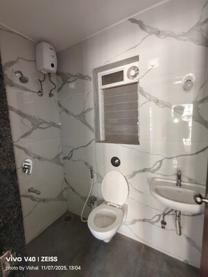 Bathroom in 1 BHK Apartment at Raunak Bliss, Ghodbunder Road – for Rent