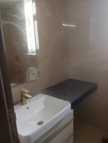 Bathroom in 3 BHK Apartment at Smart World Orchard, Sector 61 – for Rent