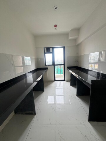 Kitchen in 3 BHK Apartment at Runwal Gardens Phase I, Dombivli East – for Rent