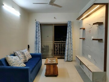 Living Room in 2 BHK Apartment at Rustomjee Urbania Aurelia, Thane West – for Rent