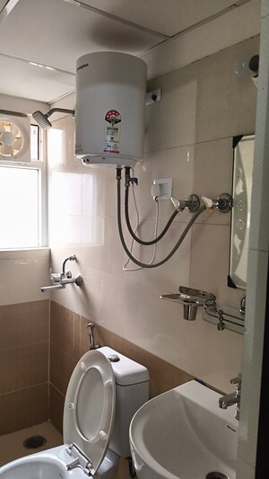 Bathroom in 2 BHK Apartment at Windsor Paradise 2, Raj Nagar Extension – for Rent