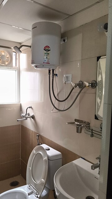 Bathroom in 2 BHK Apartment at Windsor Paradise 2, Raj Nagar Extension – for Rent