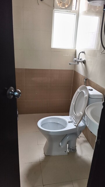 Bathroom in 2 BHK Apartment at Windsor Paradise 2, Raj Nagar Extension – for Rent