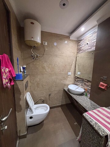 Bathroom in 4 BHK Builder Floor at Green Fields Colony – for Rent