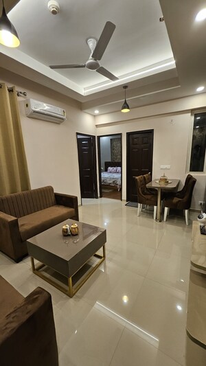 Living Room in 2 BHK Apartment at Prateek Grand City, Siddharth Vihar – for Rent