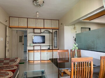 Living Room in 1 BHK Apartment at Ajmera Odyessey Apartment, Bhakti Park – for Rent