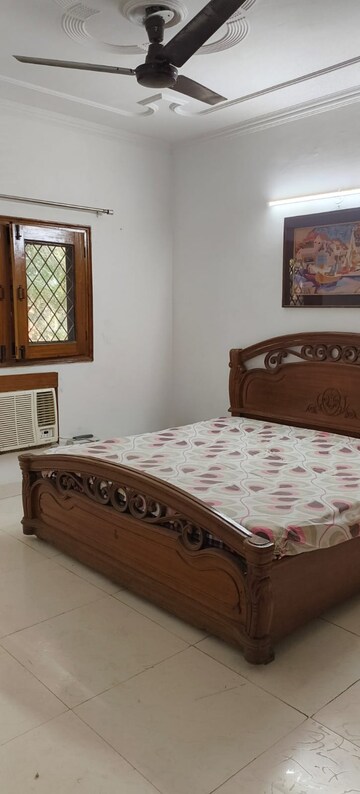 Bedroom in 3 BHK Builder Floor at Ansal Sushant Lok I, Sector 43 – for Rent