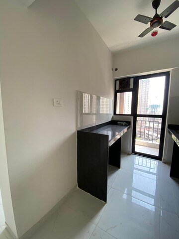 Kitchen in 1.5 BHK Apartment at Runwal Gardens Phase I, Dombivli East – for Sale