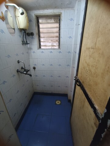 Bathroom in 1 BHK Apartment at Rishikesh CHS, Malad West – for Rent