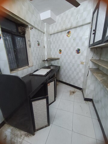 Kitchen in 1 BHK Apartment at Rishikesh CHS, Malad West – for Rent