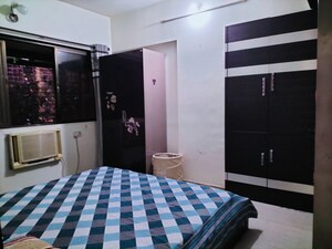 Bedroom in 3 BHK Apartment at Nav Jyotirling CHS, Malad East – for Rent