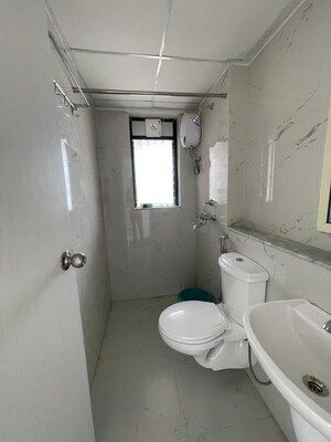 Bathroom in 2 BHK Apartment at Runwal Gardens Phase I, Dombivli East – for Sale