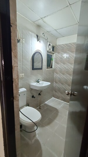 Bathroom in 2 BHK Apartment at Antriksh Golf View, Sector 78 – for Rent