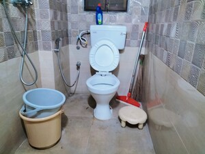 Bathroom in 3 BHK Apartment at Nav Joytiling CHS, Goregaon East – for Rent