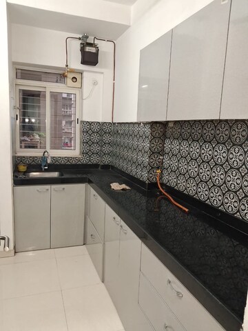 Kitchen in 2 BHK Apartment at Dosti West County, Balkum Pada – for Rent