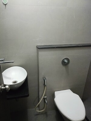 Bathroom in 1 BHK Apartment at Omkar Signet, Malad East – for Rent