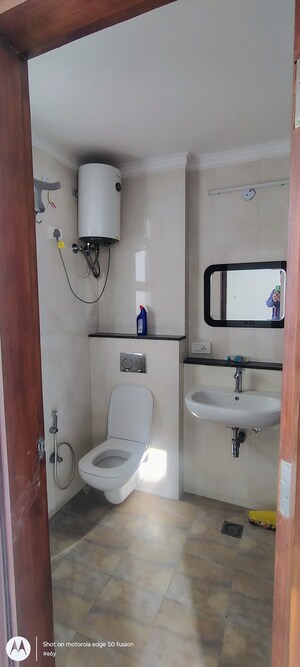 Bathroom in 4 BHK Apartment at Millenium Bajrang Society, Sector 43 – for Rent