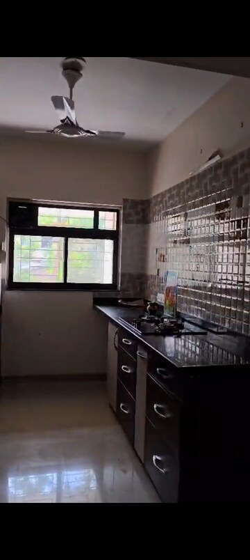 Kitchen in 2 BHK Apartment at Kalpataru Serenity, Manjari – for Rent