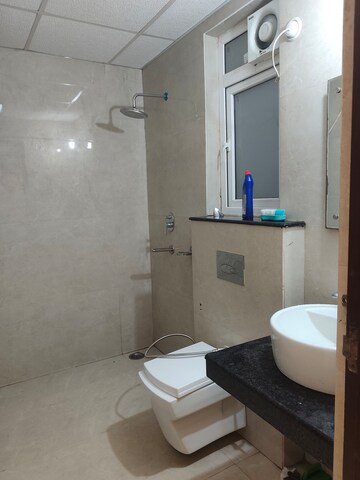 Bathroom in 3 BHK Apartment at Rishita Manhattan, Gomti Nagar – for Rent