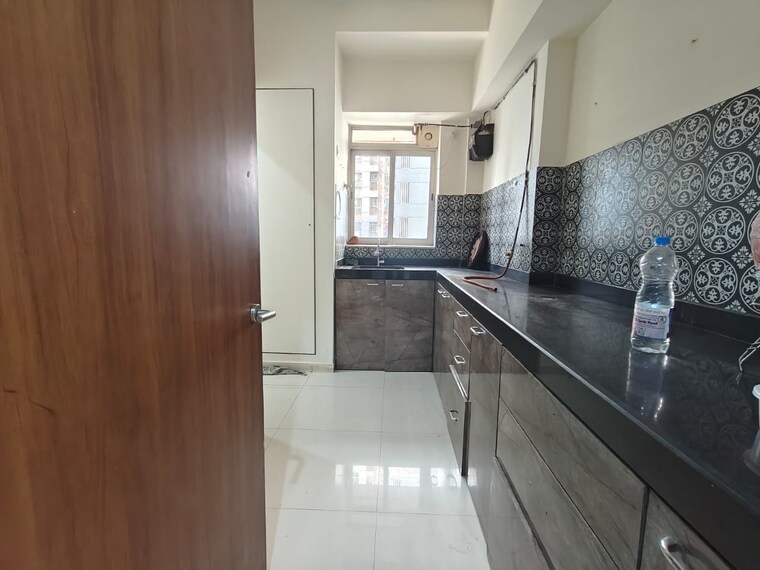 Kitchen, lodha-amara-tower-24-and-25 1.5 Bedroom 580 Sq.Ft. Apartment In Kolshet Road Thane 9616991