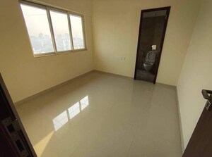 Room in 2 BHK Apartment at Omkar Signet, Malad East – for Rent