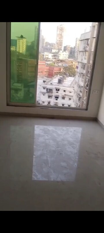 Living Room in 1.5 BHK Apartment at Alfa Mana Residence, Mazgaon – for Sale