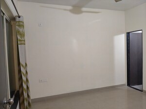 Room in 2 BHK Apartment at Mittal Arcvista, Dhanori – for Rent