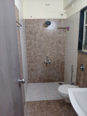 Bathroom in 2 BHK Apartment at Mittal Arcvista, Dhanori – for Rent