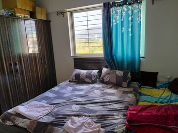Bedroom in 2 BHK Apartment at Palladium Homes, Dhanori – for Rent