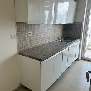 Kitchen in 3 BHK Apartment at DLF The Skycourt, Nawada Fatehpur – for Sale