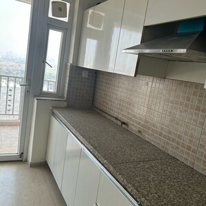 Kitchen in 3 BHK Apartment at DLF The Skycourt, Nawada Fatehpur – for Sale