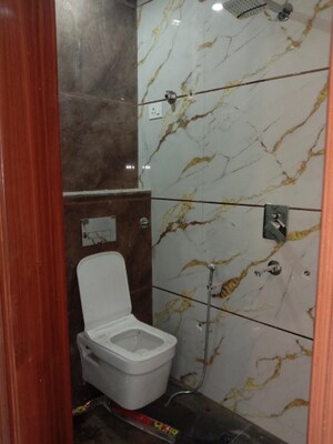 Bathroom in 4 BHK Builder Floor at Dwarka Mor – for Sale