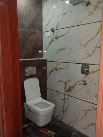 Bathroom in 4 BHK Builder Floor at Dwarka Mor – for Sale