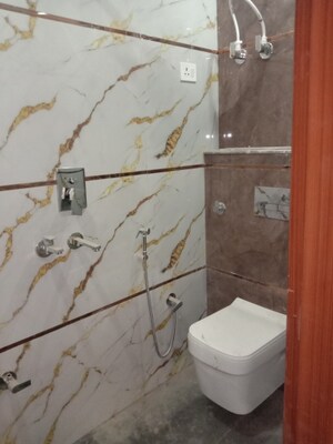 Bathroom in 4 BHK Builder Floor at Dwarka Mor – for Sale