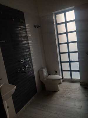 Bathroom in 4 BHK Builder Floor at Sector 15 – for Rent